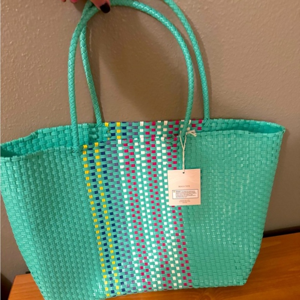 Woven Turquoise Tote Bag with stripes!Just the right size, perfect for the beach